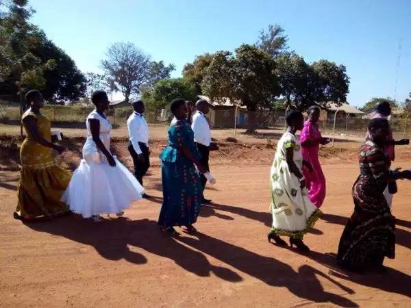 Groom And His Bride Trek To Church For Their Wedding Due To 